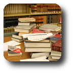 stack of books on library table